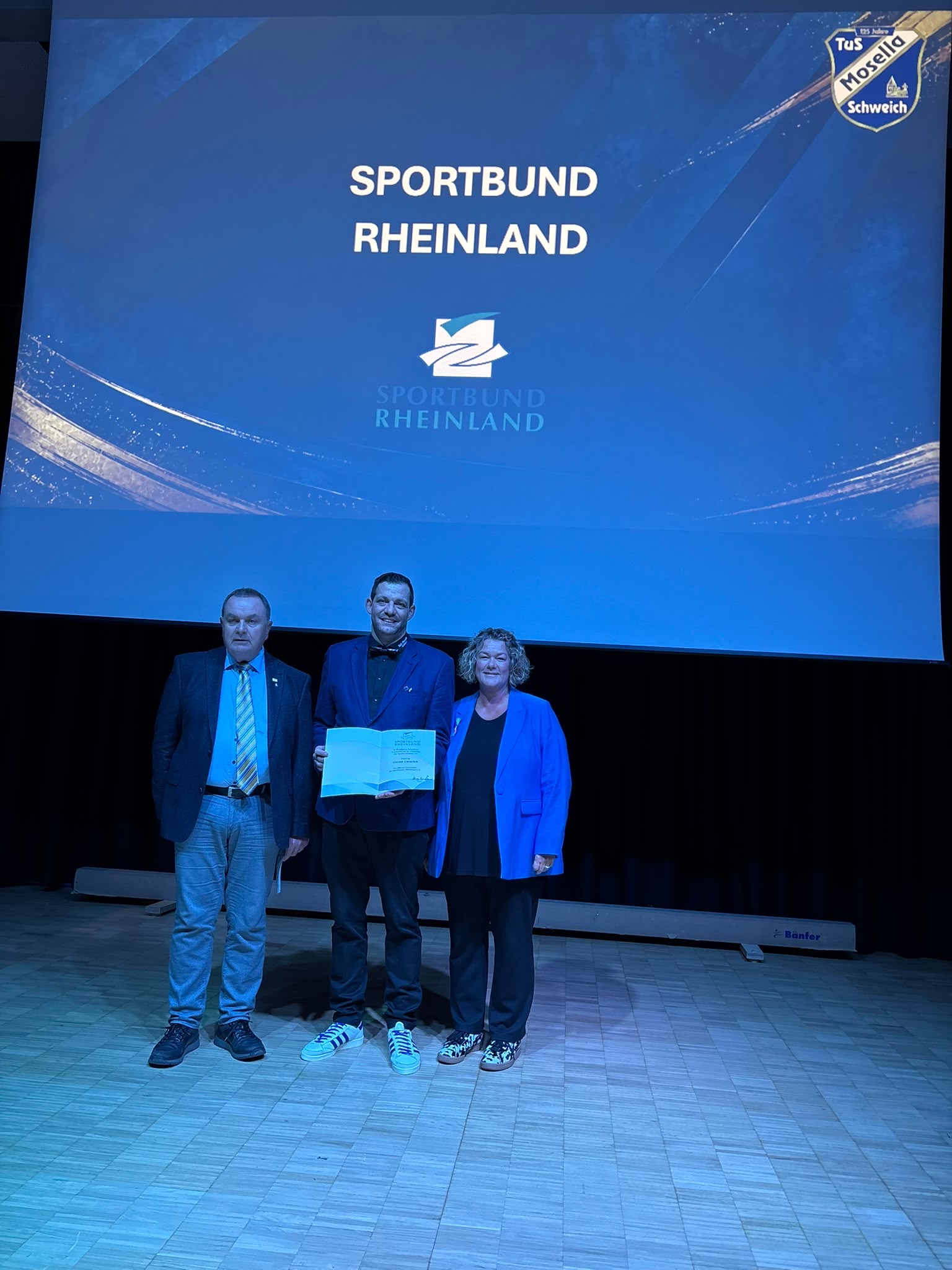 Silberne Ehrennadel und Ehrenurkunde des Sportbundes Rheinland für Harald Emmrich